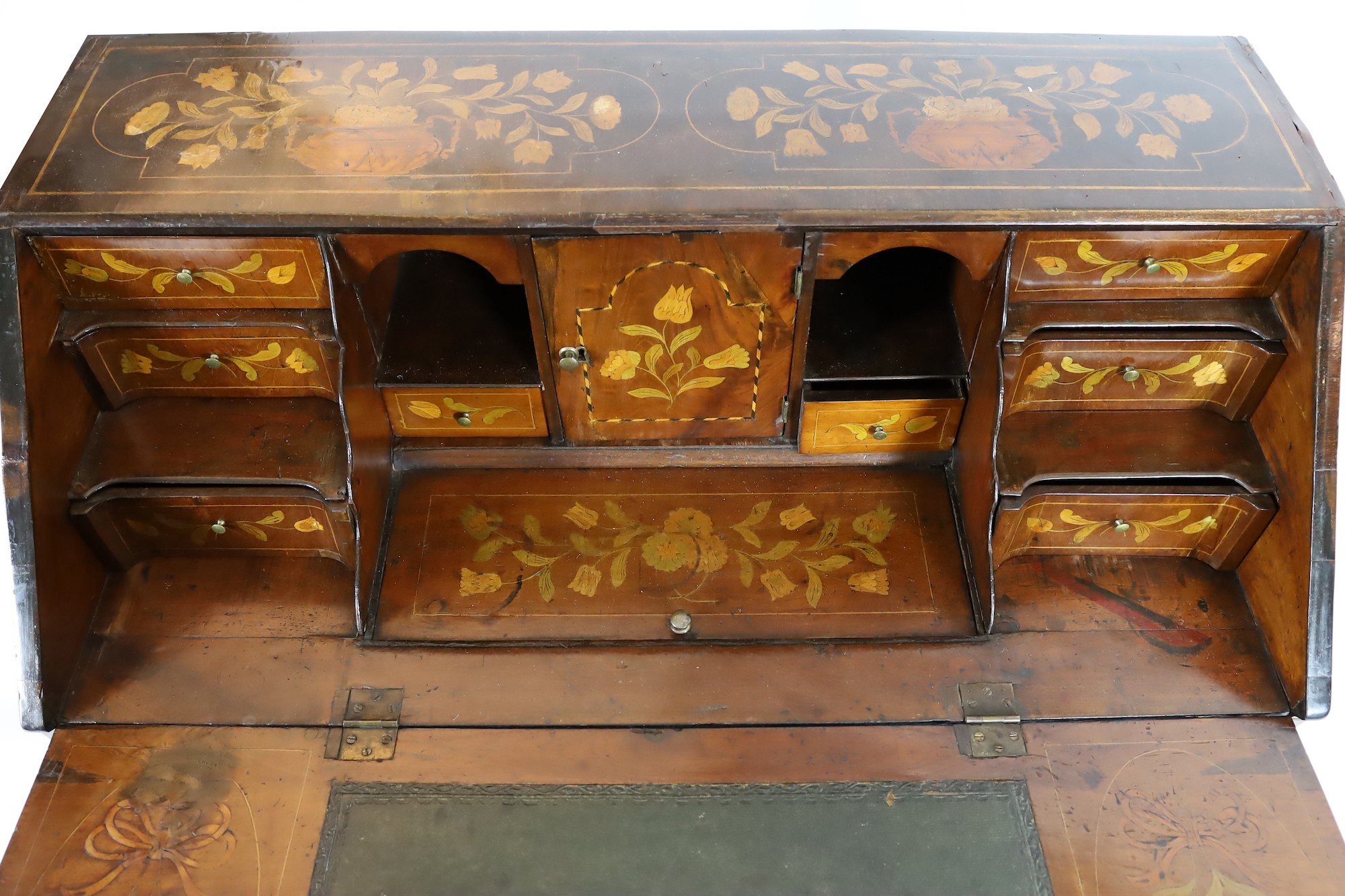 A late 18th century Dutch mahogany and floral marquetry bombé bureau, width 120cm, depth 60cm, height 111cm